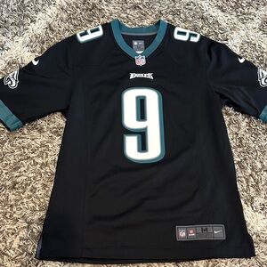 Nike Black and Teal Sports Jersey